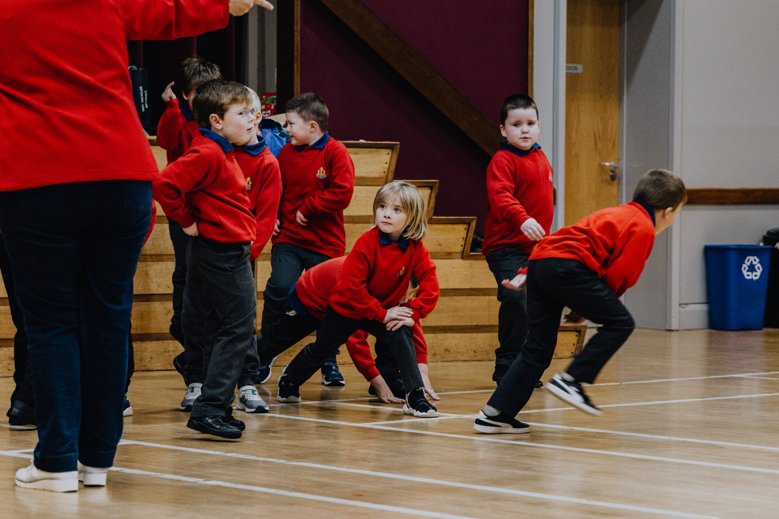 young anchor boys lined up, ready to have a race